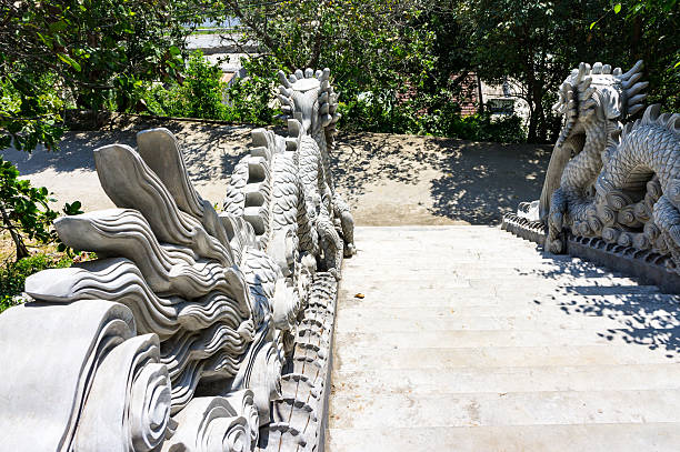 istock staircase bordered on both sides of dragons. Entrance to monastery. 538787942