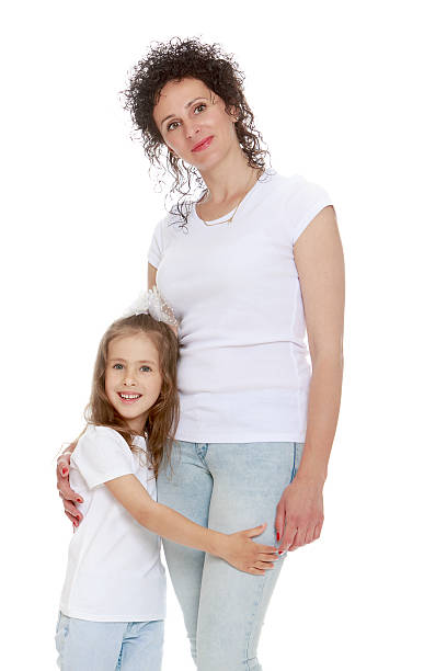 istock Mom and daughter in jeans 538788702