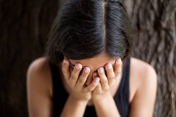 Young hispanic woman showing depression