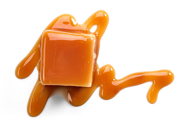 doces e molho doce de caramelo  - caramel sauces sweet sauce pouring - fotografias e filmes do acervo