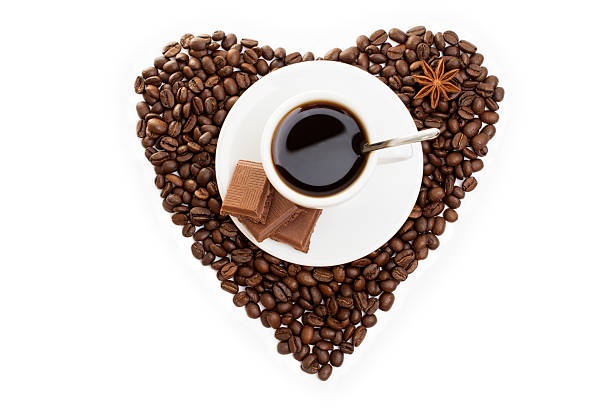 istock white cup of coffee on  beans as a heart 538795190