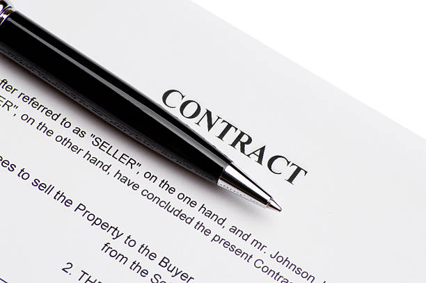 istock Close-up of pen on contract 538796246