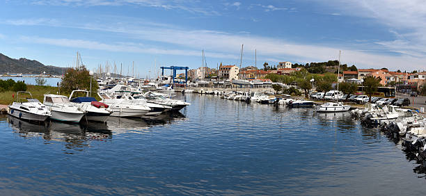 Panoramic view at Marina in Saint Florent in Corsica Panorama of Marina Saint Florent in Corsica Island, with its Yachts and pleasure boats, Saint-Florent Bay, France haute corse photos stock pictures, royalty-free photos & images
