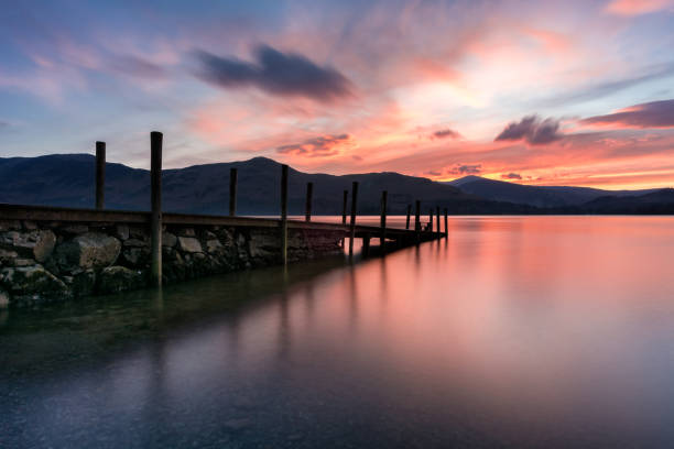 istock Vibrant Fiery Sunset Over Ashness Jetty In Lake District. 538797498