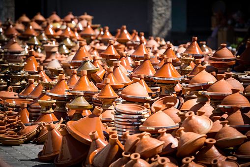 traditional arabic handcrafted, tajine pottery in a street market (souk), Morocco