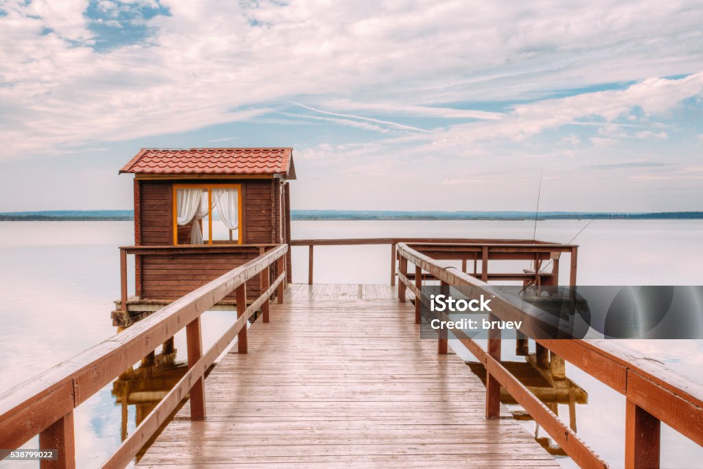 Old Wooden Pier For Fishing Small House Shed Beautiful Lake Stock