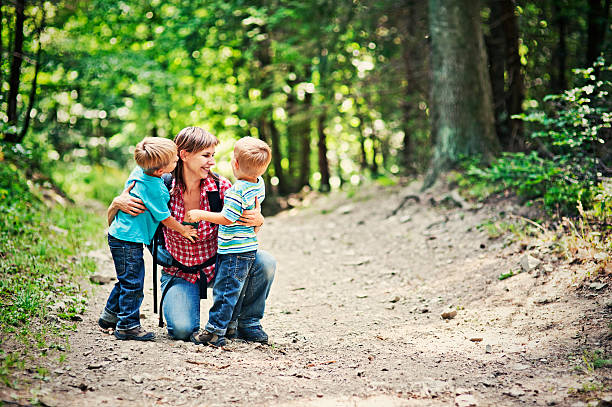 istock Mother and sons hiking 538799888