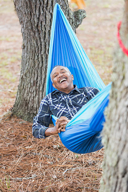 istock Senior African American man lying in hammock 538800048