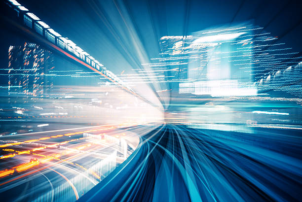 Abstract motion blurred city lights abstract motion-blurred view from the front of a train in Tokio, Japan light commercial vehicle stock pictures, royalty-free photos & images
