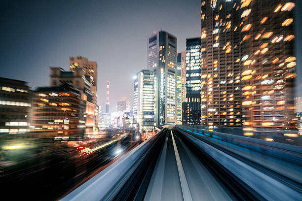 Motion blur of train moving to City