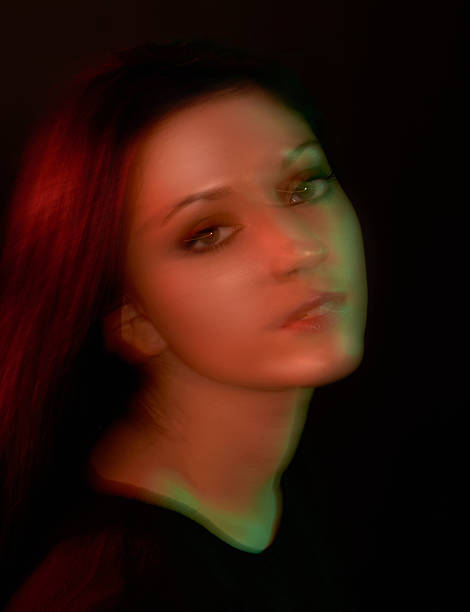 istock Low key portrait with motion blur warm light 538811243