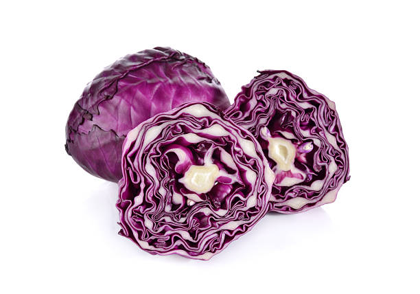 istock whole and half cut fresh red cabbage on white background 538811386