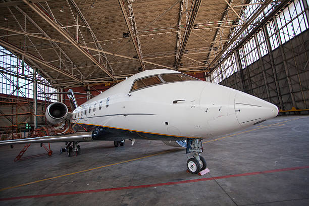 istock Business jet airplane stays in hangar. 538811651