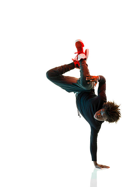 African Breakdancer African breakdancer dancing on white background. performer photos stock pictures, royalty-free photos & images