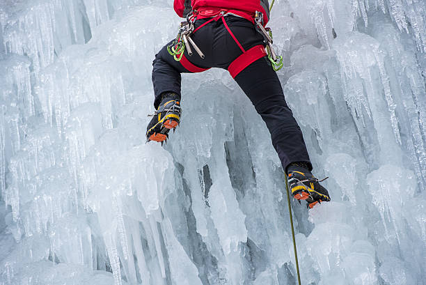 istock Ice Climber Ascending a Frozen Waterfall 538811729