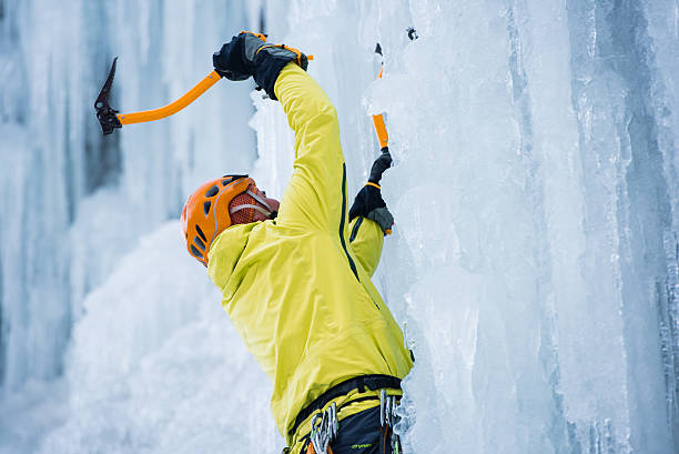 istock Ice Climber Ascending a Frozen Waterfall 538811735