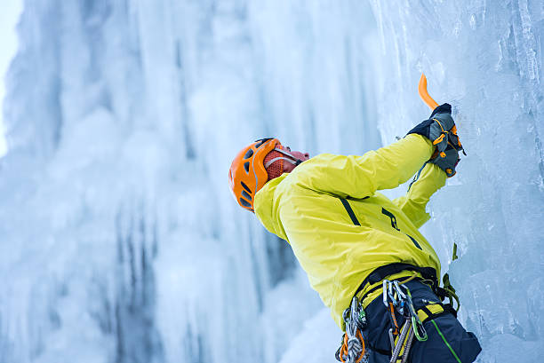 istock Ice Climber Ascending a Frozen Waterfall 538811739