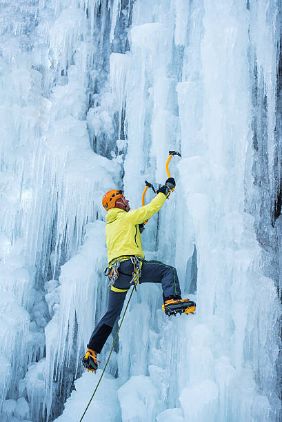 istock Ice Climber Ascending a Frozen Waterfall 538811743