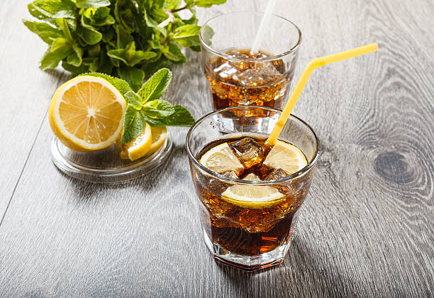 istock The cooling drink with ice, lemon and mint. 538812570