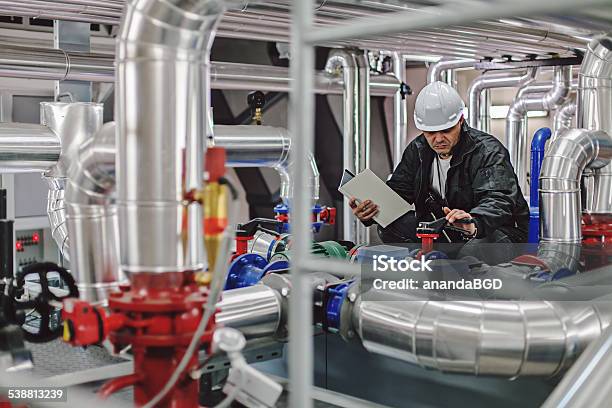 Stationary Engeneer Stock Photo - Download Image Now - Water, Installing, Construction Industry