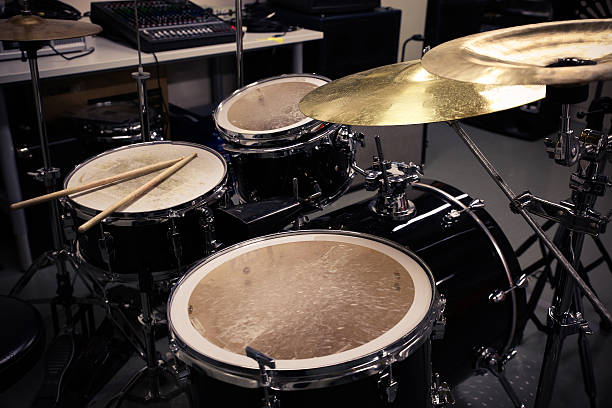 istock Drum set in training room with vintage style pictures. 538814303