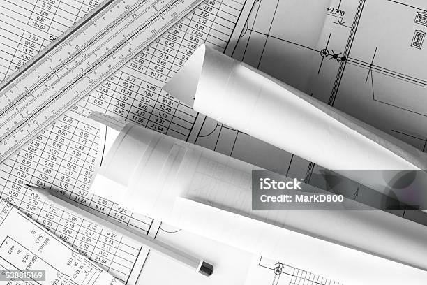 Rolls Of Drawings With The Pencil And Slide Rule Stock Photo - Download Image Now - 2015, Architect, Architecture