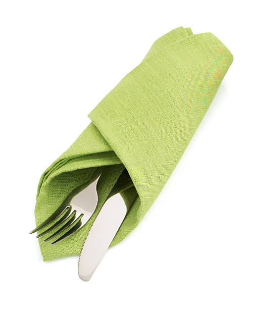 istock knife and fork at napkin on white 538827815