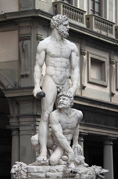 Statue of Hercules and Cacus Statue of Hercules and Cacus located in Piazza della Signoria in Florence, Italy. It was carved by Baccio Bandinelli in 1530 hercules florence italy muscular build statue stock pictures, royalty-free photos & images