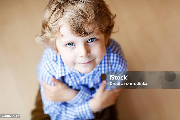 Portrait Of Adorable Little Boy With Blue Eyes Stock Photo - Download Image Now - 'at' Symbol, 2-3 Years, 2015