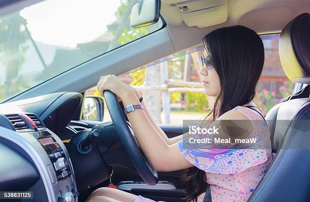 Happy Female Driver Driving A Car Stock Photo - Download Image Now - 2015, Adult, Beautiful People