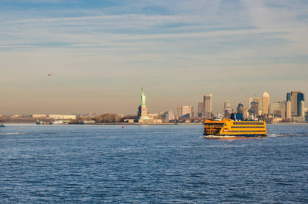 istock Staten Island Ferry passing by the Statue of Liberty 538837507
