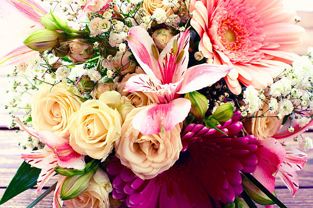istock Flowers rose on wooden surface. 538853573