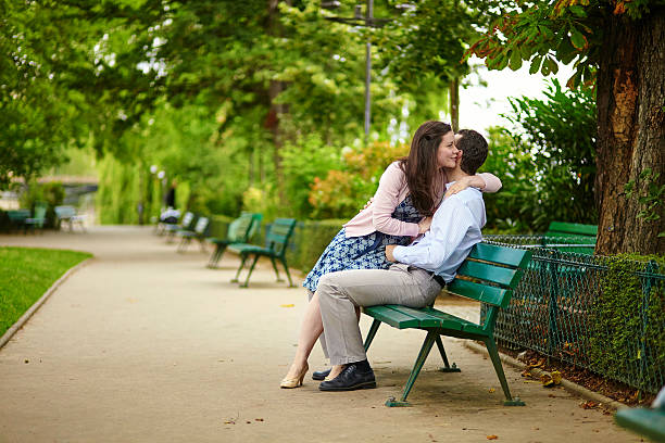 istock Dating couple on a bench in a Parisian park 538855103