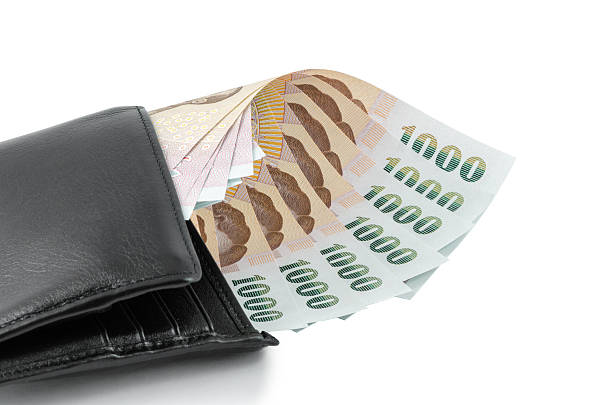 istock Bank note and black wallet over isolated background 538855805