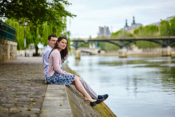 istock Couple is sitting on the embankment 538857021
