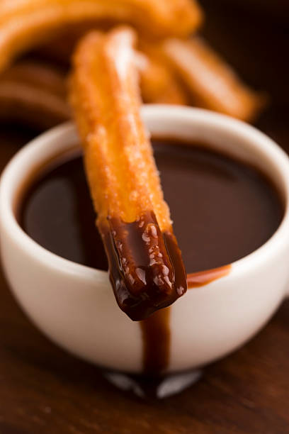 istock deliciuos spanish Churros with hot chocolate 538858947