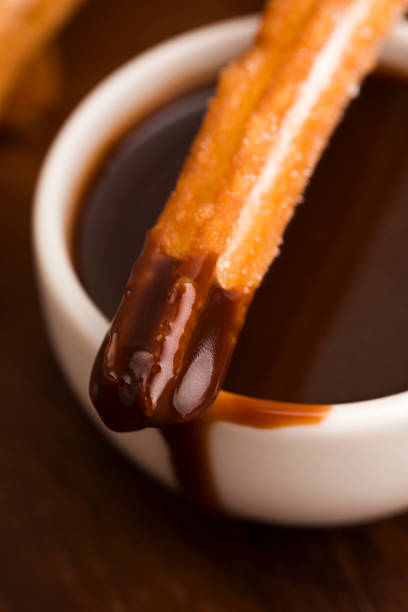 istock deliciuos spanish Churros with hot chocolate 538859139