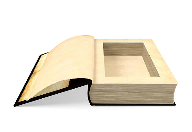 istock Opened ancient paper book with a hole in a middle 538861500