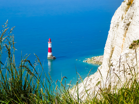 Aerial view on Beachy Head Lighthouse, Eastbourne, East Sussex, England. Selective focus