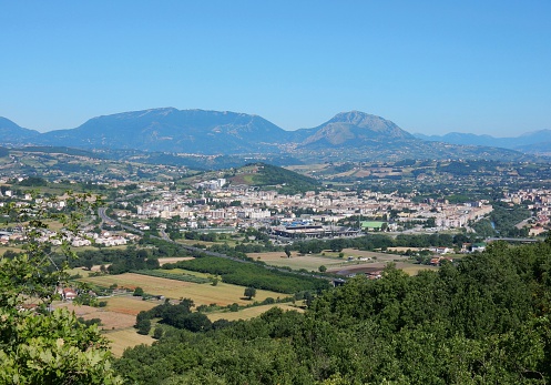 Benevento, Campania, Italy - May 31, 2016: District panoramic glimpse Freedom, the lower part of the separate city from the river Saturday, seen from via Monteguardia. In the background the Sleeper of Sannio, the limestone massif consists of the mountains Taburno (left) and Camposauro that form in the middle of the valley Vitulanese