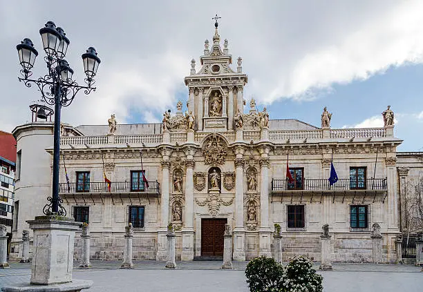 Baroque facade (1715) of the university building in Valladolid, Spain, designed by the Carmelite Fray Pedro de la Visitacion, with the emblem of the University sculpted above the main door