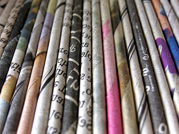 istock Many newspapers rolled and folded up lines up together 538867396