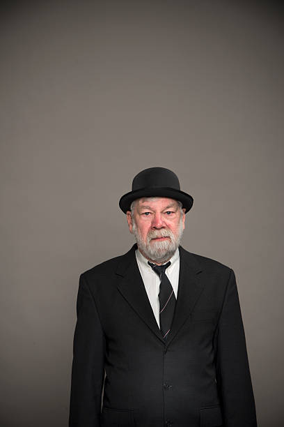 istock Englishman with bowler hat against gray 538870106