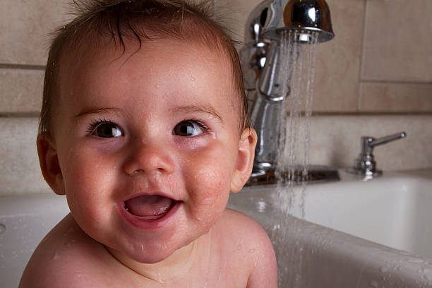 istock Happy Baby Boy Taking A Bath 538870378