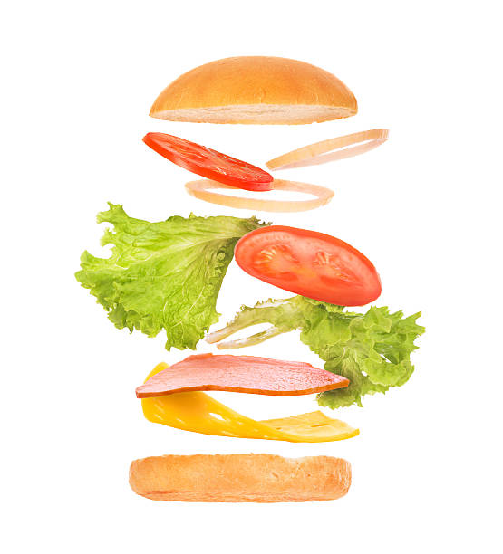 istock Delicious burger with flying ingredients on white background 538871192