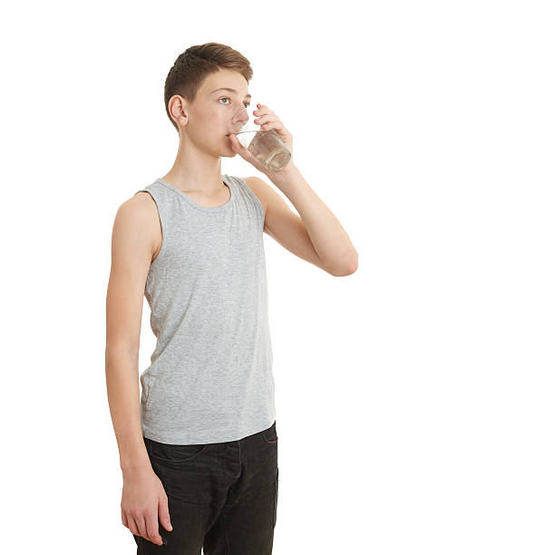 istock Cute teenager boy over white isolated background 538873742