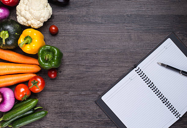 istock different fruits and vegetables on old wooden table 538875292