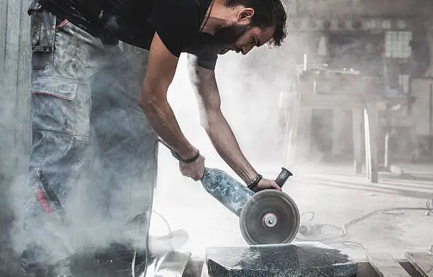 Stonecutter at his workshop, Ljubljana, Slovenia