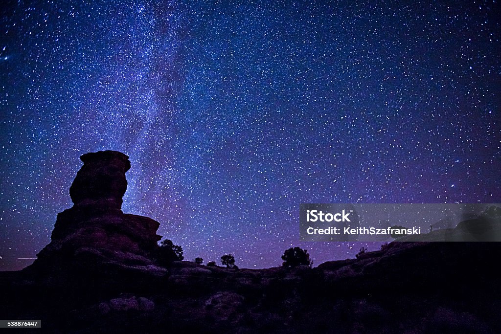 Stars Over Canyonlands National Park Stars over rock formations in Canyonlands National Park in Utah. Canyonlands National Park Stock Photo