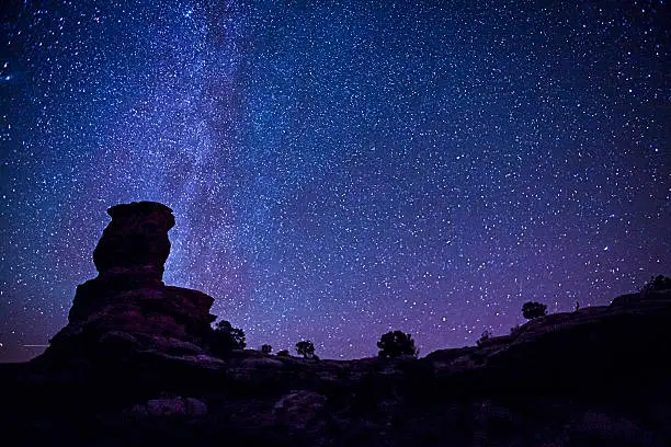Stars over rock formations in Canyonlands National Park in Utah.